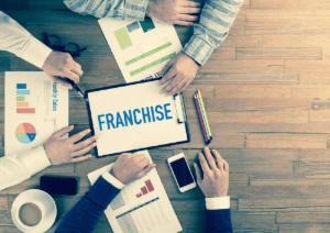 THE USE OF ARBITRATION IN RESOLVING FRANCHISE DISPUTES